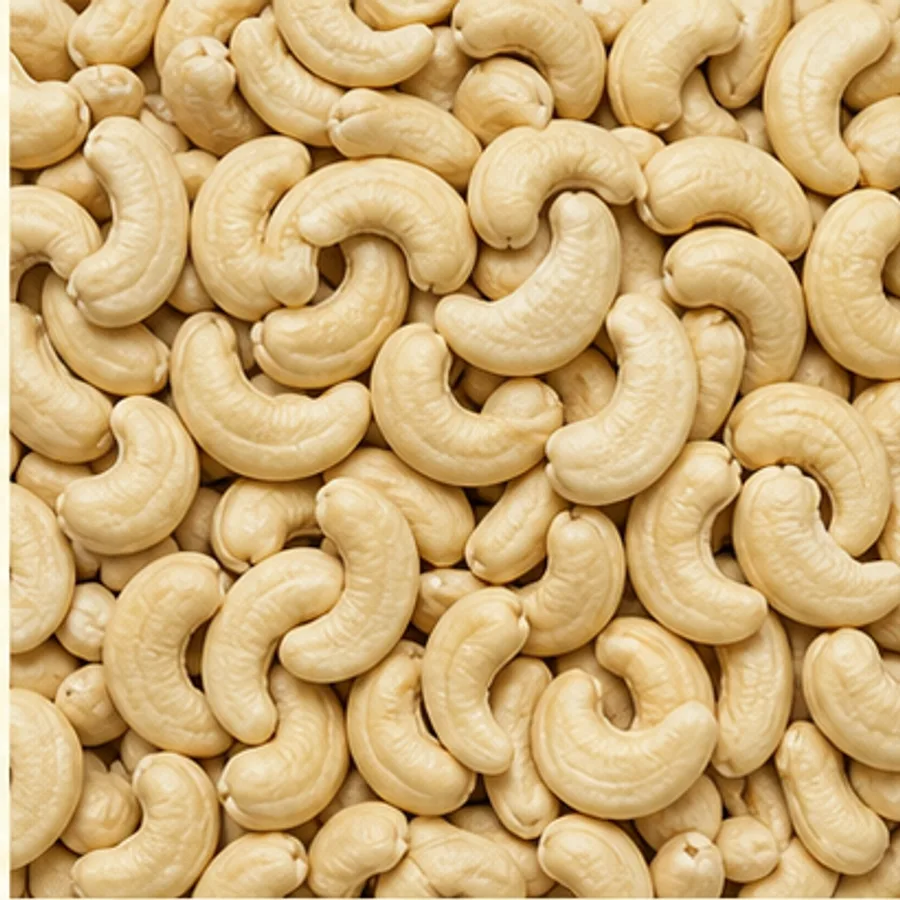 Whole white cashew kernels in a commercial product close-up